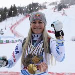 
              FILE - United States' Lindsey Vonn poses with her career's medals in the finish area after the women's downhill race, at the alpine ski World Championships in Are, Sweden, Feb. 10, 2019. Vonn details in a column for The Associated Press on Tuesday, Dec. 28, 2021 the mental health challenges she faced after retiring from ski racing. The most successful female ski racer of all time says she needed to find a new outlet after releasing all of her troubles on the mountain for so many years. (AP Photo/Marco Trovati, file)
            