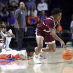 
              Texas Southern guard PJ Henry (3) dribbles upcourt after coming up with the ball against Florida guard Tyree Appleby (22) during the first half of an NCAA college basketball game Monday, Dec. 6, 2021, in Gainesville, Fla. (AP Photo/Matt Stamey)
            