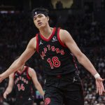 
              Toronto Raptors' Yuta Watanabe celebrates after scoring against the Milwaukee Bucks during the first half of an NBA basketball game Thursday, Dec. 2, 2021, in Toronto. (Chris Young/The Canadian Press via AP)
            