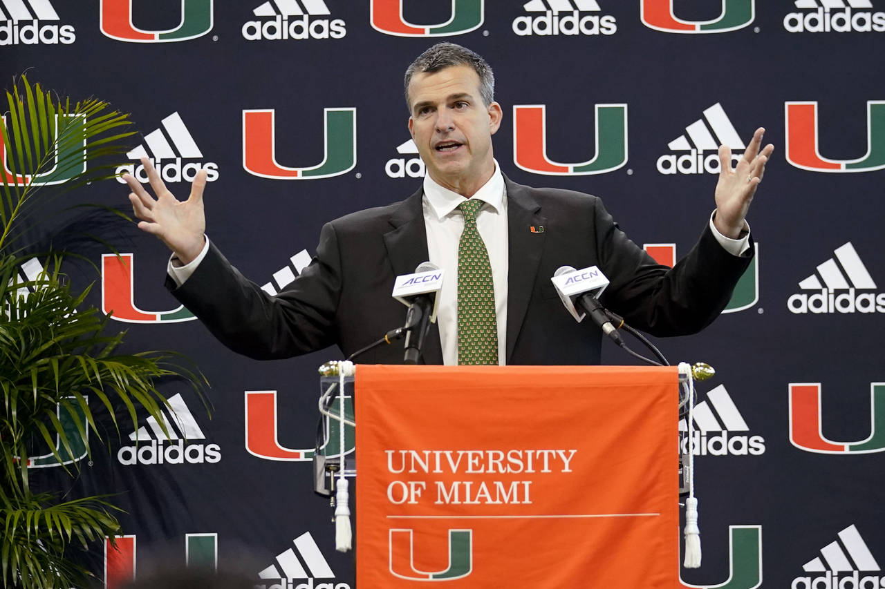 Miami football coach Mario Cristobal speaks after being introduced at a news conference, Tuesday, D...
