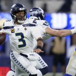 
              Seattle Seahawks quarterback Russell Wilson looks to throw during the first half of the team's NFL football game against the Los Angeles Rams on Tuesday, Dec. 21, 2021, in Inglewood, Calif. (AP Photo/Ashley Landis)
            