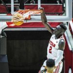 
              Utah guard Both Gach (2) dunks during the first half of an NCAA college basketball game against California, Sunday, Dec. 5, 2021, in Salt Lake City. (AP Photo/Isaac Hale)
            