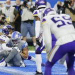
              Detroit Lions wide receiver Amon-Ra St. Brown (14), defended by Minnesota Vikings cornerback Cameron Dantzler (27) catches a 11-yard pass for a touchdown to end the NFL football game, Sunday, Dec. 5, 2021, in Detroit. (AP Photo/Duane Burleson)
            