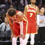 
              Atlanta Hawks guards Trae Young, left, and Timothe Luwawu-Cabarrot react in the final minute of a loss to the Houston Rockets in an NBA basketball game Monday, Dec 13, 2021, in Atlanta. (Curtis Compton/Atlanta Journal-Constitution via AP)
            