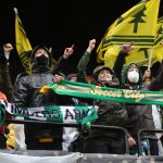 
              Portland Timbers supporters cheer prior to the MLS Cup soccer match against New York City FC on Saturday, Dec. 11, 2021, in Portland, Ore. (AP Photo/Amanda Loman)
            