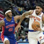 
              New York Knicks guard Tyler Hall (1) drives as Detroit Pistons forward Saddiq Bey (41) defends during the second half of an NBA basketball game, Wednesday, Dec. 29, 2021, in Detroit. (AP Photo/Carlos Osorio)
            