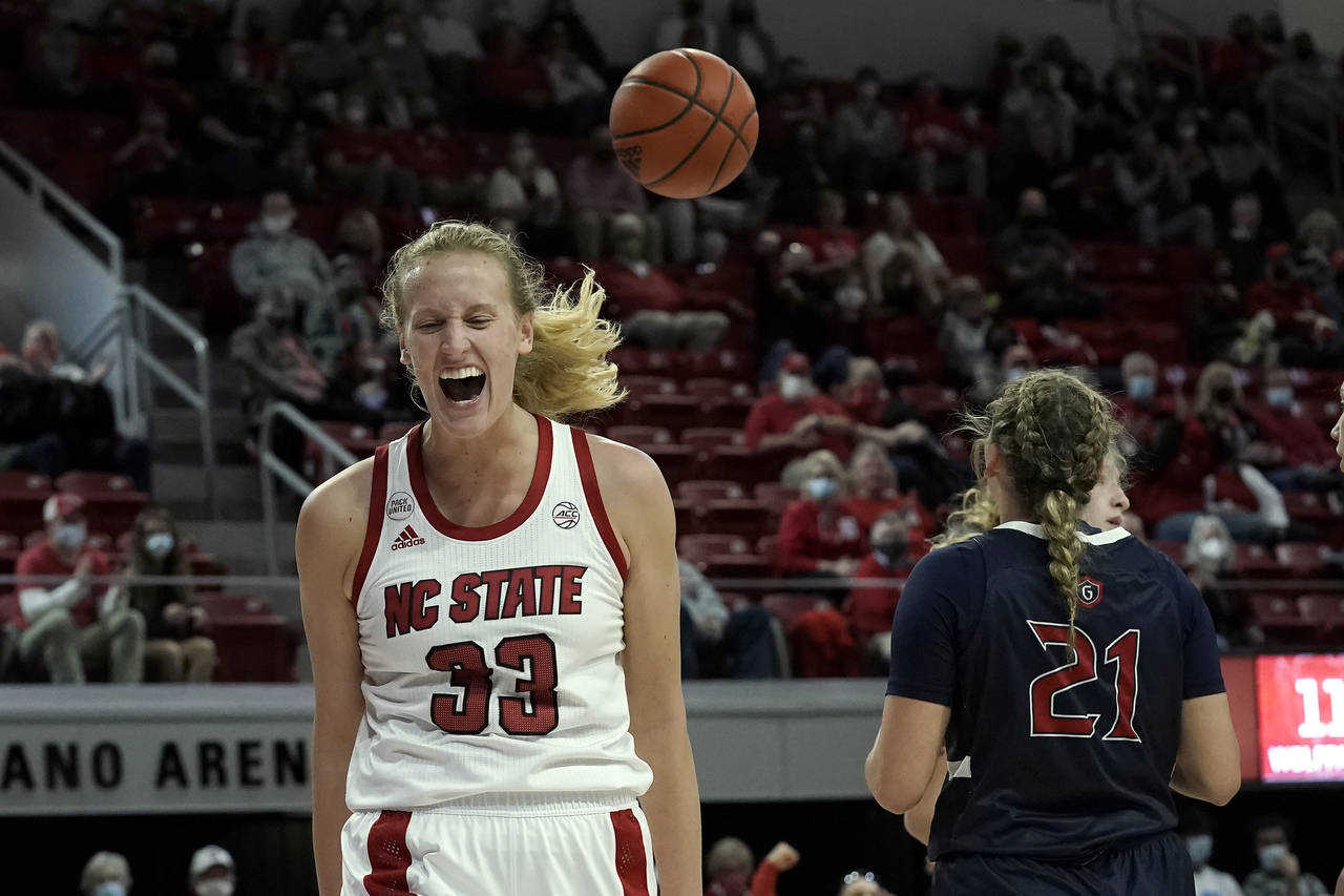 North Carolina State center Elissa Cunane (33) reacts following a basket against Saint Mary's durin...