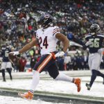 
              Chicago Bears running back Khalil Herbert scores a touchdown on a 20-yard run against the Seattle Seahawks during the second half of an NFL football game, Sunday, Dec. 26, 2021, in Seattle. (AP Photo/Lindsey Wasson)
            