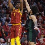 
              Iowa State guard Izaiah Brockington (1) shoots over Chicago State guard Anthony Hamilton (13) during the first half of an NCAA college basketball game Tuesday, Dec. 21, 2021, in Ames, Iowa. (AP Photo/Matthew Putney)
            