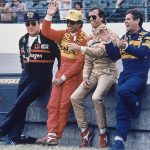 
              FILE - Indy 500 champs (from left) A.J. Foyt, Rick Mears, Danny Sullivan and Al Unser joke with the crowd as they stand along the pit wall at the Indianapolis Motor Speedway on Saturday, May 21, 1988. Foyt and Unser have each won the 500 four times, Mears have won twice, and Sullvian one. Mears, Sullvian and Unser will start the start from the race from the front row; Foyt has not yet qualified. (AP Photo, File)
            