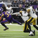 
              Minnesota Vikings running back Dalvin Cook (33) runs from Pittsburgh Steelers safety Terrell Edmunds and linebacker Marcus Allen, right, after catching a pass during the second half of an NFL football game, Thursday, Dec. 9, 2021, in Minneapolis. The Vikings won 36-28. (AP Photo/Bruce Kluckhohn)
            