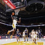 
              Tennessee forward Brandon Huntley-Hatfield (2) goes for a dunk during an NCAA college basketball game Saturday, Dec. 11, 2021, in Knoxville, Tenn. Tennessee won 76-36. (AP Photo/Wade Payne)
            