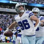 
              Dallas Cowboys tight end Dalton Schultz (86) celebrates after catching a touchdown pass against the New York Giants during the third quarter of an NFL football game, Sunday, Dec. 19, 2021, in East Rutherford, N.J. (AP Photo/Seth Wenig)
            
