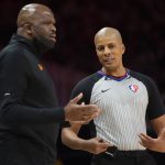
              Atlanta Hawks coach Nate McMillan talks with referee CJ Washington during the first half of the team's NBA basketball game against the Chicago Bulls on Monday, Dec. 27, 2021, in Atlanta. (AP Photo/Hakim Wright Sr.)
            