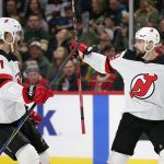 
              New Jersey Devils left wing Tomas Tatar (90) celebrates his goal against the Minnesota Wild with teammate Dougie Hamilton (7) during the second period of an NHL hockey game, Thursday, Dec. 2, 2021, in St. Paul, Minn. (AP Photo/Andy Clayton-King)
            
