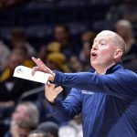
              Kent State head coach Rob Senderoff reacts during the first half of an NCAA college basketball game against West Virginia in Morgantown, W.Va., Sunday, Dec. 12, 2021. (AP Photo/William Wotring)
            
