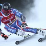 
              France's Mathieu Faivre speeds down the course during an alpine ski, men's World Cup giant slalom, in Alta Badia, Italy, Sunday, Dec.19, 2021. (AP Photo/Gabriele Facciotti)
            