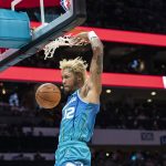 
              Charlotte Hornets guard Kelly Oubre Jr. dunks during the first half of the team's NBA basketball game against the Houston Rockets, Monday, Dec. 27, 2021, in Charlotte, N.C. (AP Photo/Matt Kelley)
            
