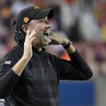 
              Iowa State head coach Matt Campbell calls out instructions from the sideline during the first half of the Cheez-It Bowl NCAA college football game against Clemson, Wednesday, Dec. 29, 2021, in Orlando, Fla. (AP Photo/Phelan M. Ebenhack)
            
