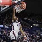 
              Gonzaga guard Rasir Bolton dunks during the first half of an NCAA college basketball game against North Alabama, Tuesday, Dec. 28, 2021, in Spokane, Wash. (AP Photo/Young Kwak)
            