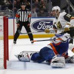 
              Vegas Golden Knights' Nicolas Roy (10) scores the winning penalty shot past New York Islanders' goalie Ilya Sorokin during an NHL hockey game Sunday, Dec. 19, 2021, in Elmont, N.Y. (AP Photo/John Munson)
            