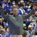 
              Kentucky coach John Calipari gestures during the second half of the team's NCAA college basketball game against Southern in Lexington, Ky., Tuesday, Dec. 7, 2021. (AP Photo/James Crisp)
            