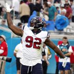 
              Houston Texans linebacker Chris Smith (92) celebrates after making a play against the Jacksonville Jaguars during the first half of an NFL football game, Sunday, Dec. 19, 2021, in Jacksonville, Fla. (AP Photo/Stephen B. Morton)
            