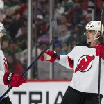 
              New Jersey Devils defenseman Ryan Graves (33) celebrates his goal against the Minnesota Wild during the second period of an NHL hockey game, Thursday, Dec. 2, 2021, in St. Paul, Minn. (AP Photo/Andy Clayton-King)
            