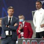 
              FILE - Leipzig's head coach Jesse Marsch, left, reacts during the Group A Champion's League soccer match between RB Leipzig and Club Brugge at the Red Bull Arena in Leipzig, Germany, on Sept. 28, 2021. At right is Leipzig's assistant coach Achim Beierlorzer, who will replace him. American Jesse Marsch is no longer coach of Bundesliga team Leipzig. The club said Sunday that the two had “mutually agreed to end the cooperation. That is the result of an in-depth analysis and intensive discussions” after Friday’s 2-1 loss at Union Berlin. (AP Photo/Michael Sohn, file)
            