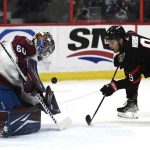 
              Ottawa Senators centre Josh Norris (9) watches his shot rebound off the chest of Colorado Avalanche goaltender Justus Annunen (60) during the second period of an NHL hockey game Saturday, Dec. 4, 2021, in Ottawa, Ontario. (Justin Tang/The Canadian Press via AP)
            