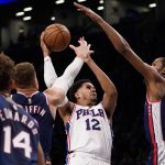 
              Philadelphia 76ers forward Tobias Harris (12) goes to the basket as Brooklyn Nets forward Kevin Durant (7) Blake Griffin and Kessler Edwards (14) defend during the first half of an NBA basketball game, Thursday, Dec. 16, 2021, in New York. (AP Photo/Mary Altaffer)
            