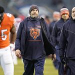 
              Chicago Bears head coach Matt Nagy, center, walks off the field with Joel Iyiegbuniwe after the team's 33-22 loss to the Arizona Cardinals during the second half of an NFL football game Sunday, Dec. 5, 2021, in Chicago. (AP Photo/Nam Y. Huh)
            