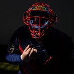 
              An Atlanta Braves catcher waits to workout during spring training baseball practice on Feb. 23, 2021, in North Port, Fla. (AP Photo/Brynn Anderson)
            