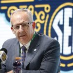
              FILE - Southeastern Conference Commissioner Greg Sankey speaks at a press conference on March 11, 2020, in Nashville, Tenn. Over the past two years Sankey has helped the conference land a new additional $350 million television rights deal with ESPN and guided it through the uncertainty of the pandemic. (AP Photo/Mark Humphrey, File)
            
