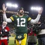 
              Green Bay Packers' Aaron Rodgers celebrates after an NFL football game against the Cleveland Browns Saturday, Dec. 25, 2021, in Green Bay, Wis. The Packers won 24-22. (AP Photo/Matt Ludtke)
            