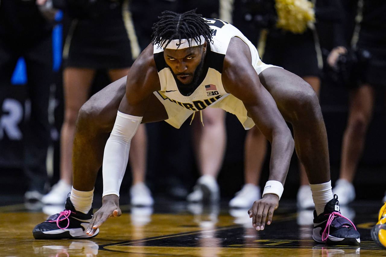 Purdue forward Trevion Williams celebrates after a basket against Iowa during the second half of an...