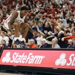 
              Auburn guard K.D. Johnson (0) reacts after a turnover by Central Florida during the first half of an NCAA college basketball game Wednesday, Dec. 1, 2021, in Auburn, Ala. (AP Photo/Butch Dill)
            