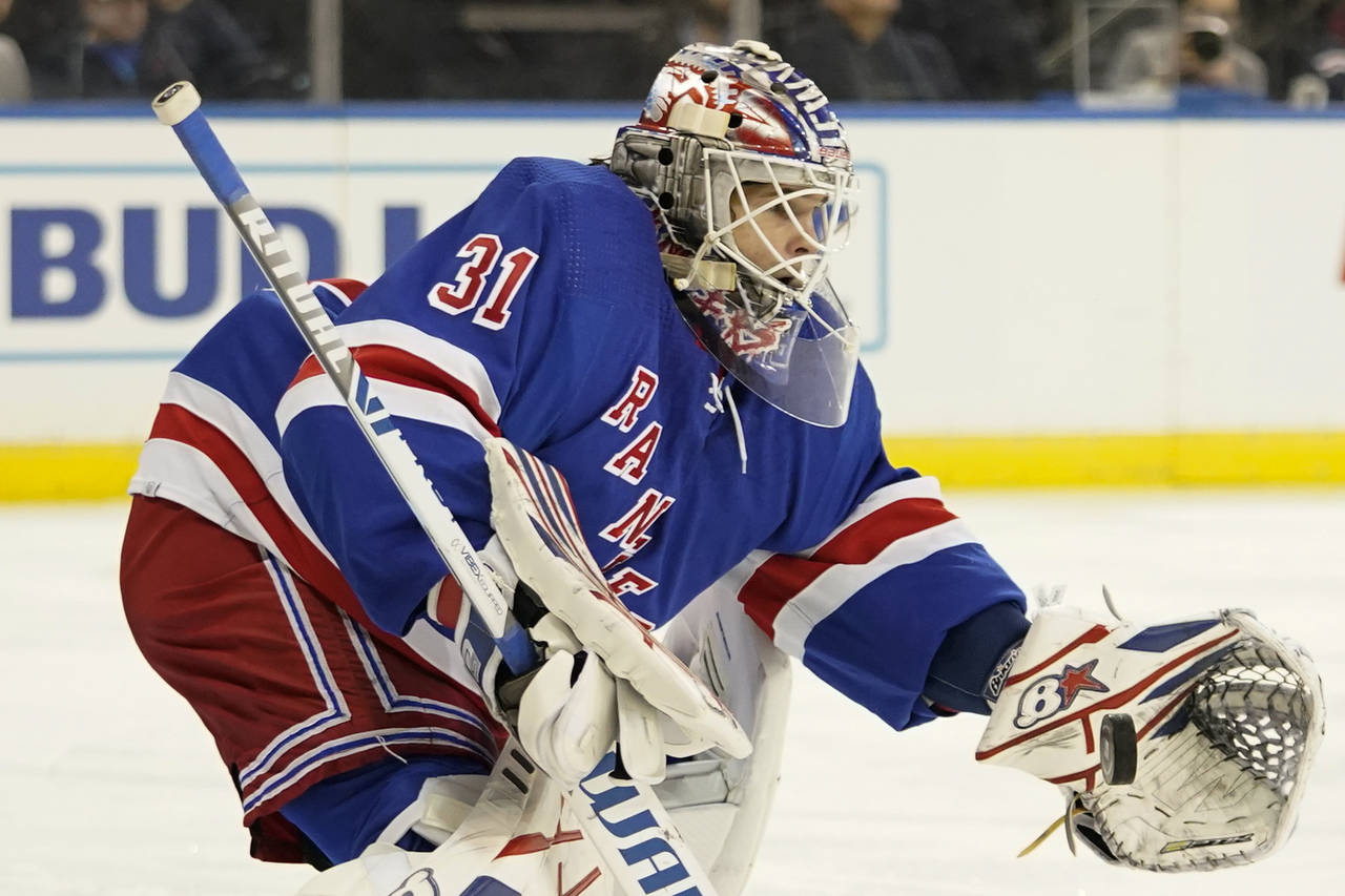 New York Rangers goaltender Igor Shesterkin makes a save against the Philadelphia Flyers during the...