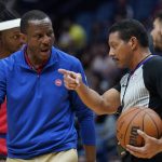 
              Detroit Pistons head coach Dwane Casey challenges a foul in the second half of an NBA basketball game against the New Orleans Pelicans in New Orleans, Friday, Dec. 10, 2021. (AP Photo/Gerald Herbert)
            