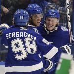 
              Tampa Bay Lightning right wing Mathieu Joseph (7, center,) celebrates his goal against the Los Angeles Kings with defenseman Mikhail Sergachev (98) and left wing Ross Colton (79) during overtime of an NHL hockey game Tuesday, Dec. 14, 2021, in Tampa, Fla. (AP Photo/Chris O'Meara)
            