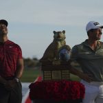 
              Viktor Hovland, of Norway, right, and Tiger Woods pose for the photographers during the trophy ceremony of the Hero World Challenge PGA Tour at the Albany Golf Club, in New Providence, Bahamas, Sunday, Dec. 5, 2021. Viktor Hovland won the tournament with -17 strokes under par.. (AP Photo/Fernando Llano)
            