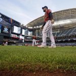 
              FILE - Arizona Diamondbacks' Steven Souza Jr. walks on new synthetic grass at Chase Field before a spring training baseball game against the Chicago White Sox, March 25, 2019, in Phoenix, Ariz. The Diamondbacks ripped out the grass at the field ahead of the 2019 season, replacing it with the artificial turf. The team says they've saved about 16 million gallons of water because of it. (AP Photo/Elaine Thompson, File)
            