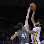 
              LSU center Efton Reid shoots against Lipscomb forward Jacob Ognacevic (41) during the first half of an NCAA college basketball game in Baton Rouge, La., Wednesday, Dec. 22, 2021. (AP Photo/Matthew Hinton)
            