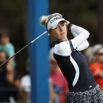 
              Nelly Korda watches her tee shot on the first hole during the second round of the PNC Championship golf tournament Sunday, Dec. 19, 2021, in Orlando, Fla. (AP Photo/Scott Audette)
            
