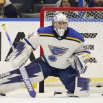 
              St. Louis Blues emergency goaltender Kyle Konin warms up before an NHL hockey game against the Tampa Bay Lightning Thursday, Dec. 2, 2021, in Tampa, Fla. Konin was called into service when goaltender Jordan Binnington was diagnosed with coronavirus. (AP Photo/Chris O'Meara)
            