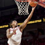 
              Arkansas guard Au'Diese Toney (5) makes a layup against Arkansas-Little Rock during the first half of an NCAA college basketball game Saturday, Dec. 4, 2021, in Fayetteville, Ark. (AP Photo/Michael Woods)
            