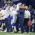 
              Dallas Cowboys offensive tackle Terence Steele, center left, celebrates with head coach Mike McCarthy, center right, after Steele caught a touchdown pass in the first half of an NFL football game against the Washington Football Team in Arlington, Texas, Sunday, Dec. 26, 2021. (AP Photo/Michael Ainsworth)
            