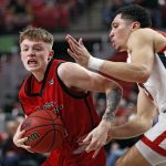 
              Eastern Washington's Mason Landdeck (24) dribbles the ball around Texas Tech's Clarence Nadolny (3) during the first half of an NCAA college basketball game on Wednesday, Dec. 22, 2021, in Lubbock, Texas. (AP Photo/Brad Tollefson)
            