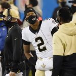 
              FILE -New Orleans Saints quarterback Jameis Winston wears a face mask on the sidelines against the Carolina Panthers during the first half of an NFL football game Sunday, Jan. 3, 2021, in Charlotte, N.C. U.S. sports leagues are seeing rapidly increasing COVID-19 outbreaks with dozens of players in health and safety protocols, amid an ongoing surge by the delta variant of the coronavirus and rising cases of the highly transmissible omicron mutation. (AP Photo/Gerry Broome, File)
            