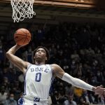 
              Duke forward Wendell Moore Jr. (0) drives for a dunk against Appalachian State during the first half of an NCAA college basketball game in Durham, N.C., Thursday, Dec. 16, 2021. (AP Photo/Gerry Broome)
            